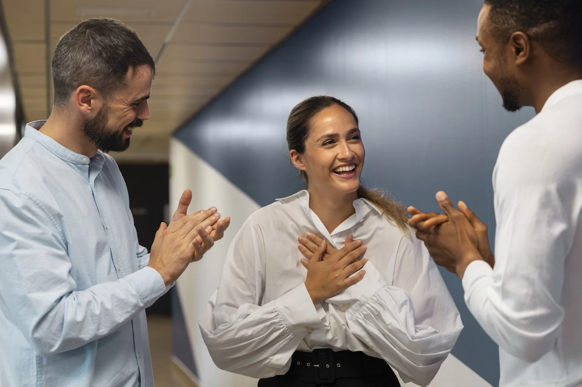 person expressing appreciation their workmates